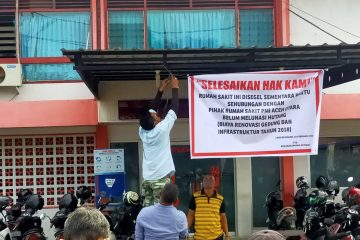 PT Peugot Konstruksi menyegel RS PMI Aceh Utara.]