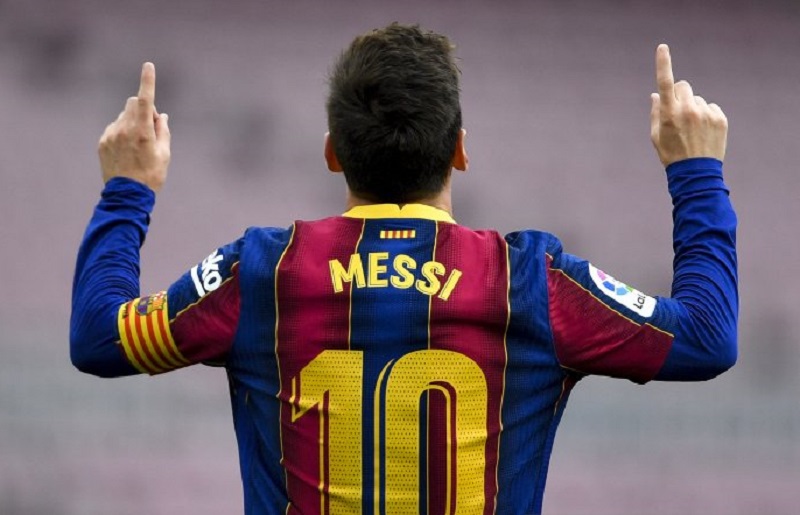 Selebrasi khas megabintang Barcelona asal Argentina, Lionel Messi.(AFP/PAU BARRENA