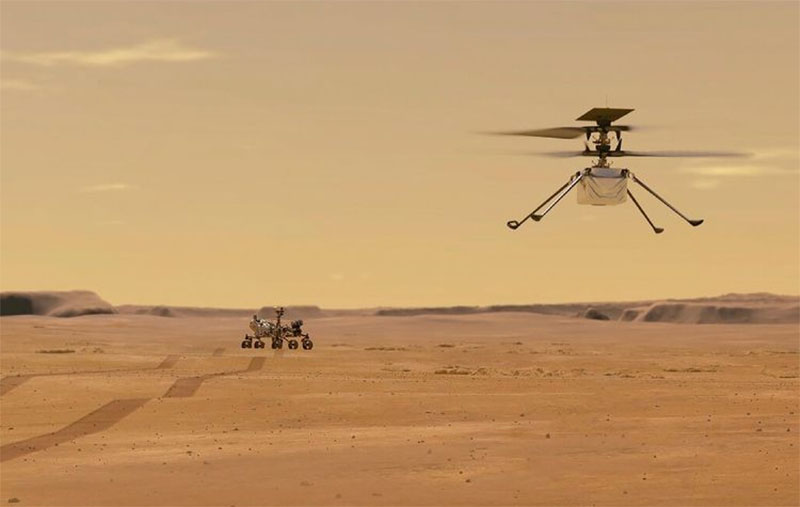 Ilustrasi Helikopter Ingenuity saat melakukan uji penerbangan di Mars.(phys)