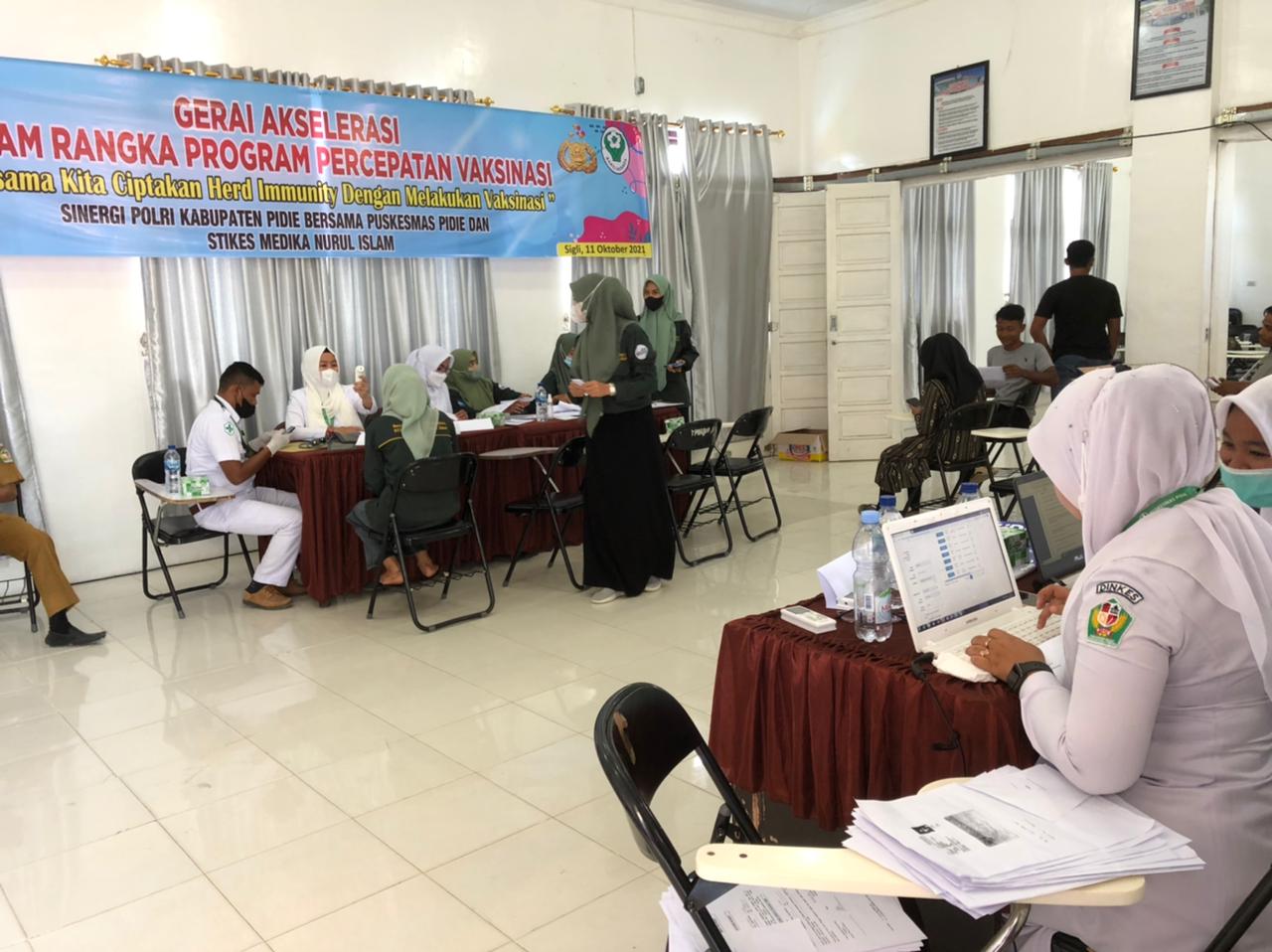 Polres Pidie Bersama Puskesmas dan STIKes MNI Bersinergi Buat Gerai Akselerasi Vaksin