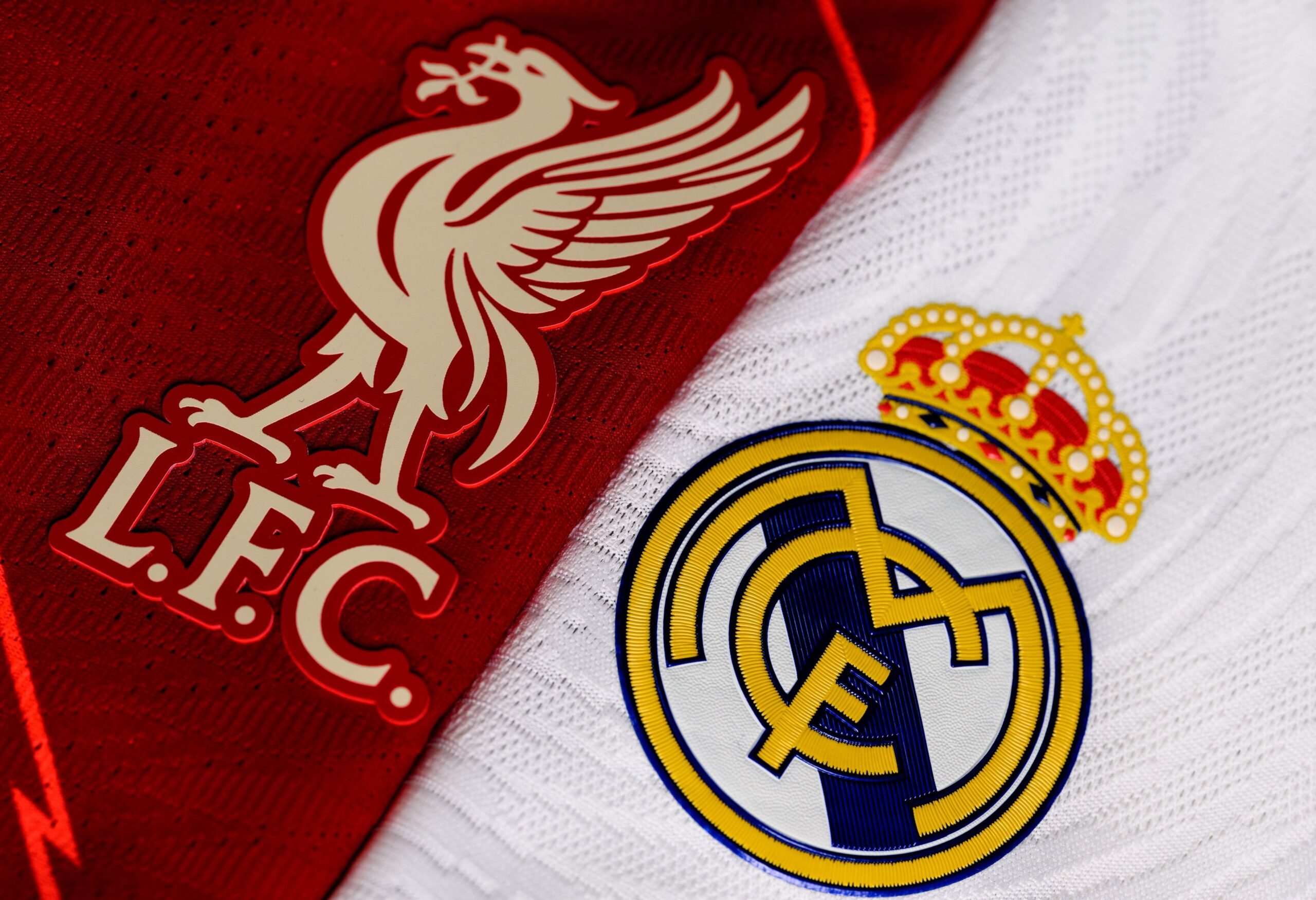 Logo Liverpool FC dan Real Madrid. (Foto: Literasinews)