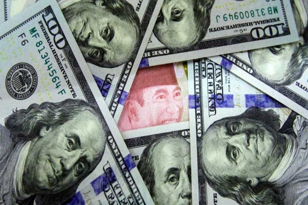 Rupiah dan Dolar AS. (Foto: market.bisnis.com)