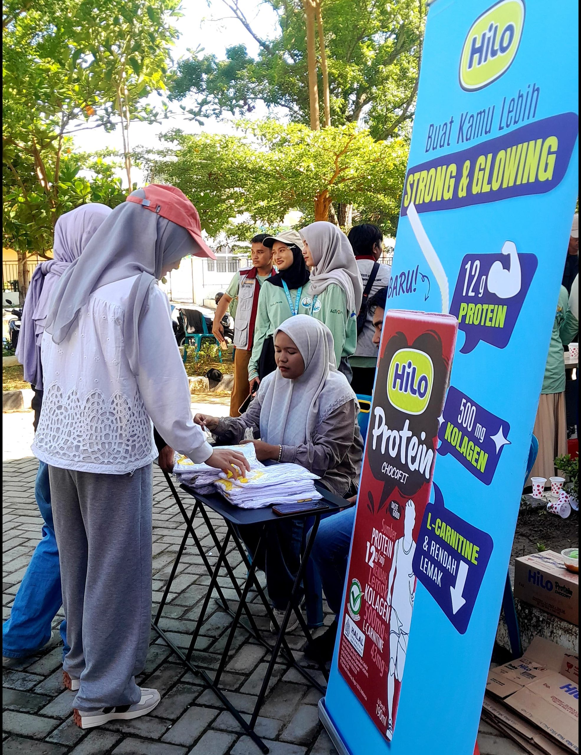 Hilo Bagikan Ratusan Susu Gratis di Fun Walk U-DARE 2.0 Universitas Syiah Kuala. (Foto: Nukilan)