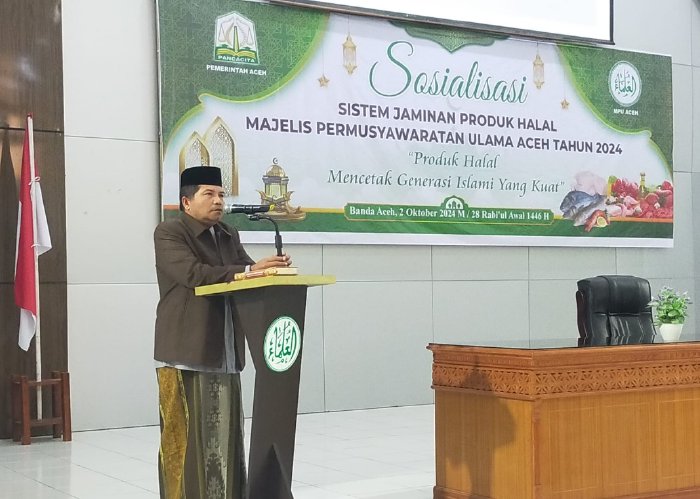 Ketua MPU Aceh, Tgk. H. Faisal Ali saat membuka kegiatan Sosialisasi Sistem Jaminan Produk Halal MPU Aceh Tahun 2024 di Gedung Tgk. H. Abdullah Ujong Rimba. (Foto: MPU)