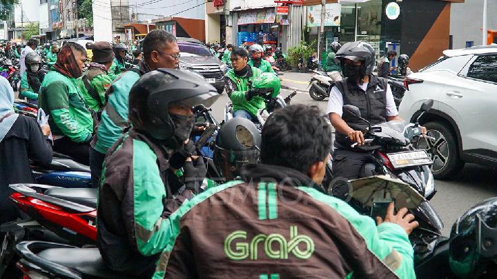 Menaker Minta Aplikator Berikan THR Ojek Online dalam Bentuk Uang Tunai. (Foto: Tempo)