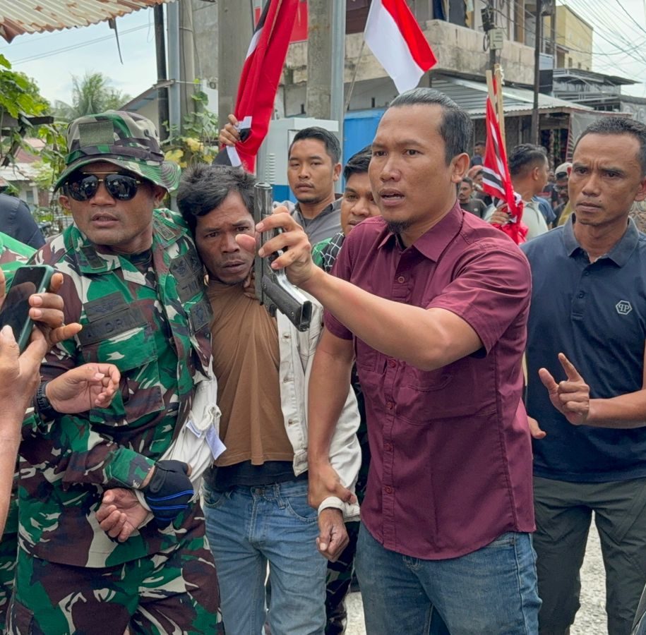 Pembawa Pistol dalam Konvoi Bendera Bulan Bintang di Lhokseumawe Terancam Hukuman 20 Tahun Penjara. (Foto: For Nukilan)