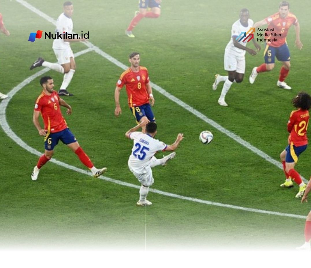Laga Spanyol vs Prancis (Foto: REUTERS/Angelika Warmuth)