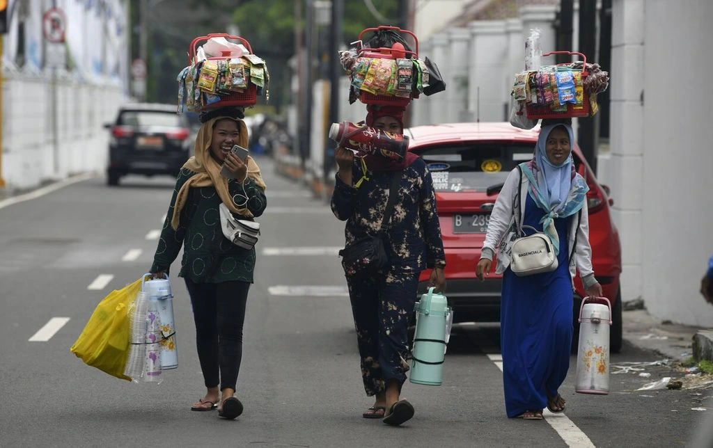 Ilustrasi pekerja sektor informal. (Foto: Kompas)