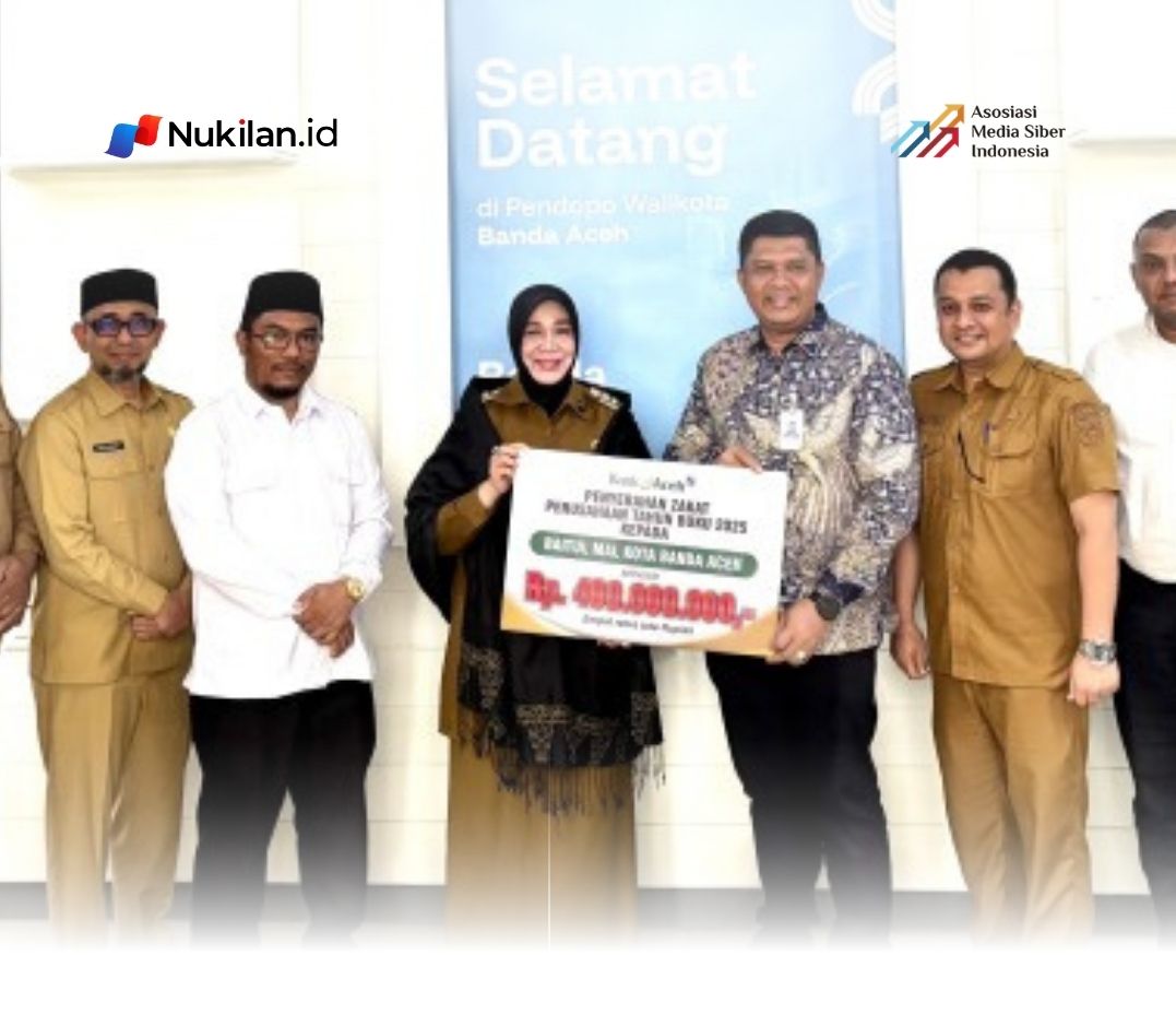 PT Bank Aceh Syariah Kantor Cabang Utama (KCU) menyerahkan zakat perusahaan senilai Rp400 juta kepada Baitul Mal Kota Banda Aceh. Penyerahan zakat berlangsung di Pendopo Wali Kota Banda Aceh, Senin, 10 Agustus 2026. (Foto: For Nukilan)