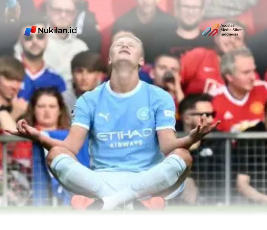 Striker Manchester City, Erling Haaland, merayakan golnya ke gawang Manchester United dalam lanjutan Premier League 2026/2027 di Old Trafford, Minggu (13/9/2026) malam WIB. (Foto: Paul ELLIS / AFP)