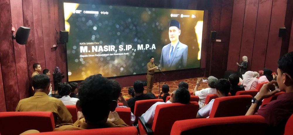 Kepala Dinas Perpustakaan dan Kearsipan Aceh (DKPA), M Nasir saat memberikan sambutan pada Award Ceremony Aceh Documentary Competition (ADC) 2026 yang digelar Aceh Documentary di Perpustakaan Wilayah Aceh, Lamgugob, Kecamatan Syiah Kuala, Banda Aceh, Senin (28/9/2026). (Foto: Nukilan/Sammy)