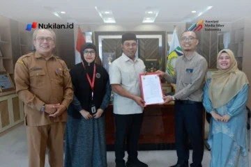 Universitas Muhammadiyah Aceh (Unmuha) dan Pemerintah Kabupaten (Pemkab) Aceh Besar menjalin kerja sama melalui penandatanganan nota kesepahaman atau Memorandum of Understanding (MoU) di Kantor Bupati Aceh Besar, Selasa (13/10/2026). (Foto: Humas Abes)