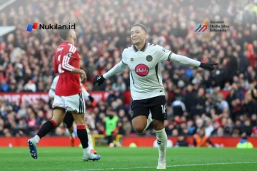 Selebrasi Marcus Tavernier setelah mencetak gol dalam pertandingan sepak bola Liga Inggris Manchester United vs Bournemouth di Old Trafford di Manchester, barat laut Inggris, pada 25 Oktober 2026. (Foto: Darren Staples / AFP)