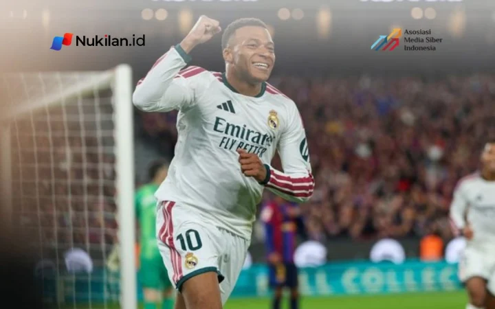 Penyerang Real Madrid asal Prancis, Kylian Mbappe, merayakan gol pertama timnya dalam pertandingan Liga Spanyol antara FC Barcelona dan Real Madrid CF di Stadion Camp Nou, Barcelona, pada 25 Oktober 2026.(Foto: AFP/LLUIS GENE)